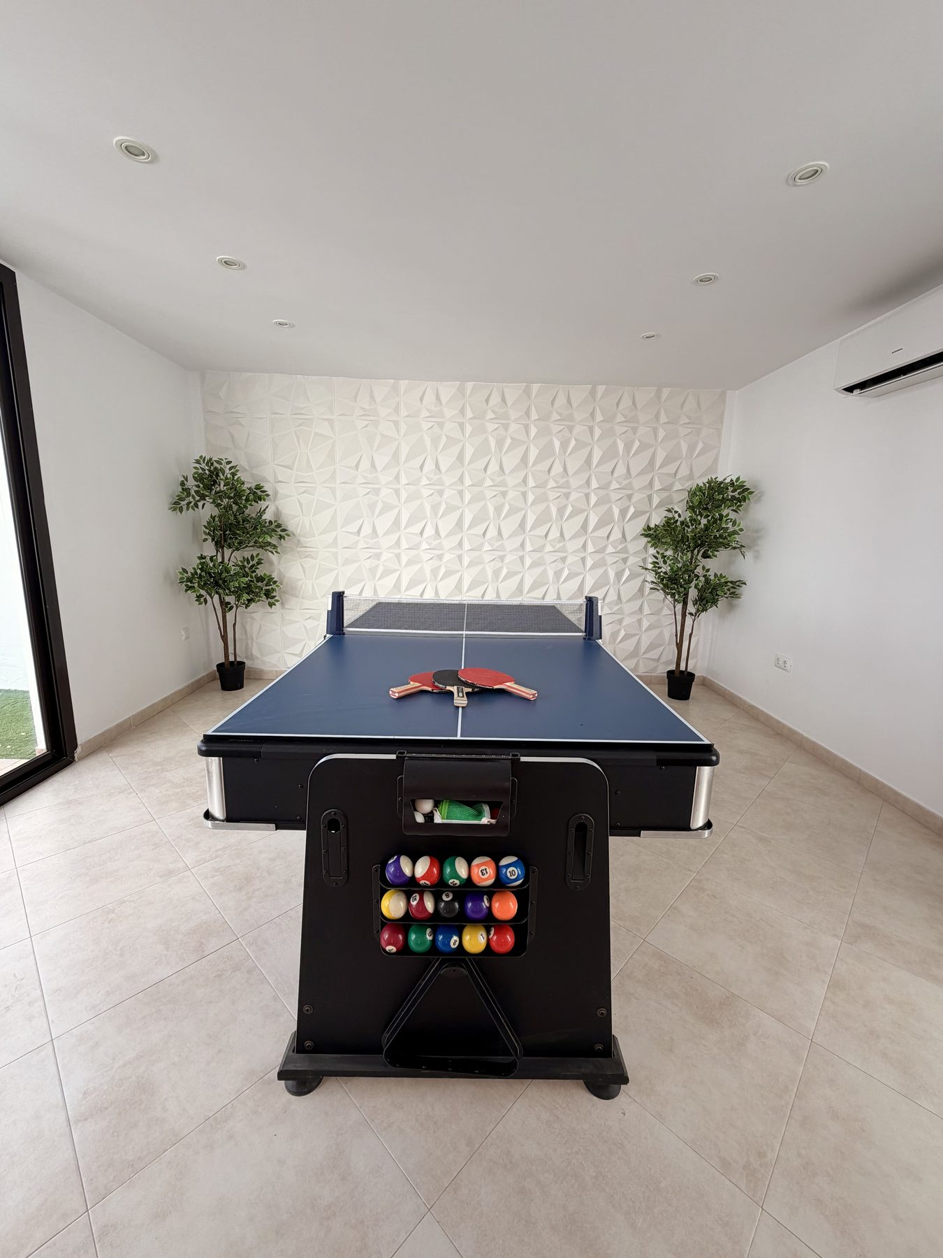 Games room with pool and table tennis table