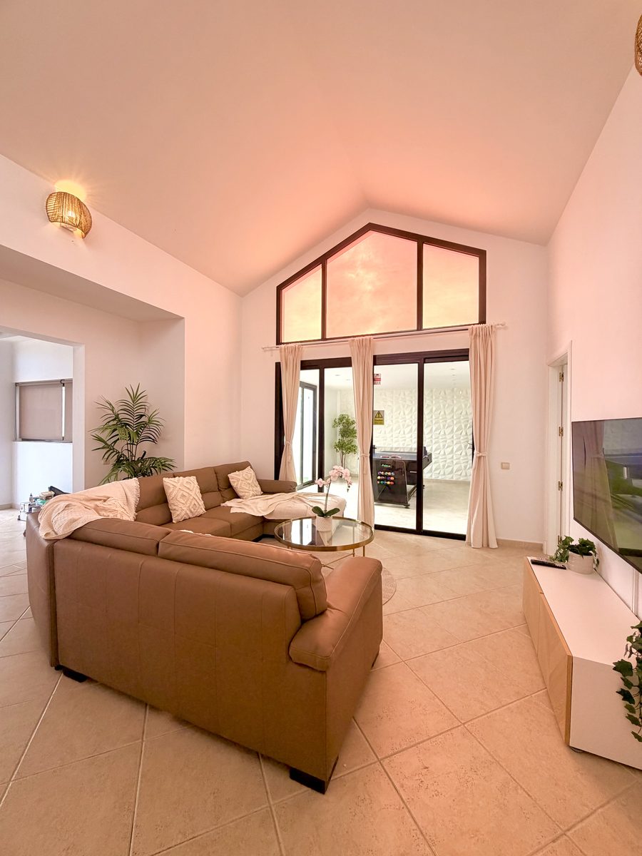 Vaulted living room with golden evening light
